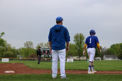 Assistant Coach Adam Frost and Cade Johnson