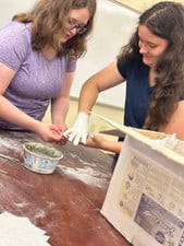 Jade getting her hand plastered